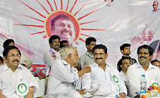 Praja Rajyam leader Ganta Srinivasa Rao having a word with former minister Reddy Satyanarayana at a party meeting organised by fans of Chiranjeevi in the city on Sunday. 