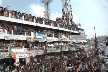 People scaled everything possible to have a better view of Chiranjeevi in Dharmavaram on Monday.