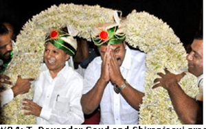 T. Devender Goud and Chiranjeevi greet supporters after the merger of Nava Telangana Party with Praja Rajyam in Hyderabad 
