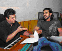 Music director Mani Sarma and actor Ram Charan Teja during the recording of the Praja Rajyam party song